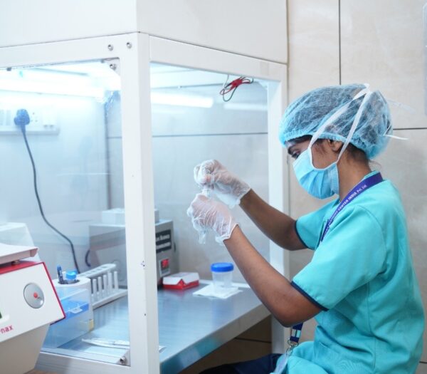Rathna Fertility Center - nurse testing the blood samples