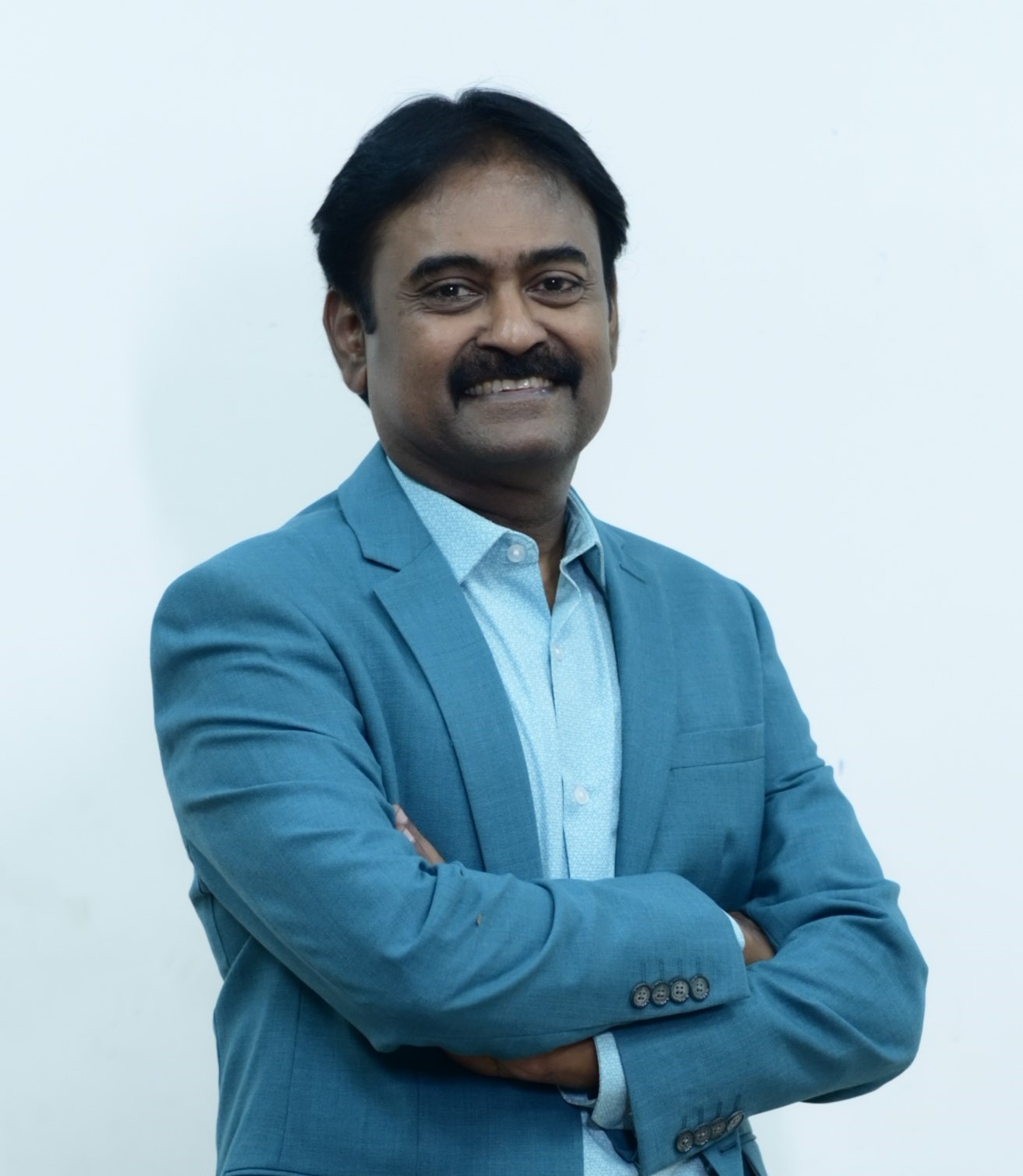 Dr. Mahilan
